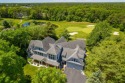 Remodeled with elegance, this property is positioned on a for sale in Mashpee Massachusetts Barnstable County County on GolfHomes.com