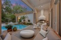 Experience the epitome of luxury living in Villoresi, an for sale in Naples Florida Collier County County on GolfHomes.com