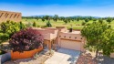 Beauty and peace abound in this light-filled home. Enjoy for sale in Santa Fe New Mexico Santa Fe County County on GolfHomes.com