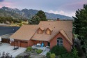 This beautiful custom home is perfectly positioned to showcase for sale in Cottonwood Heights Utah Salt Lake County County on GolfHomes.com
