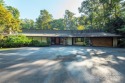 A rare opportunity awaits you in this secluded gem. You can live for sale in Asheville North Carolina Buncombe County County on GolfHomes.com