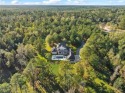 Nestled within the gates of Money Hill, this stunning two-story for sale in Abita Springs Louisiana St. Tammany Parish County on GolfHomes.com