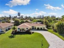 Step into your slice of paradise nestled in Lely Golf Estates for sale in Naples Florida Collier County County on GolfHomes.com