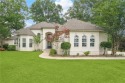 Experience luxury living in this remarkable CUSTOM HOME on the for sale in Abita Springs Louisiana St. Tammany Parish County on GolfHomes.com