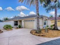 LOCATION is everything with this 2/2 block and stucco Woodlawn for sale in The Villages Florida Sumter County County on GolfHomes.com