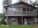 Two story home near lake and golf course. Property has addition for sale in Pleasant Lake Michigan Jackson County County on GolfHomes.com