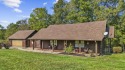 Sitting in the scenic Woodlawn Estates community along Lake for sale in Lancaster Kentucky Garrard County County on GolfHomes.com