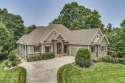 Welcome to 102 Vinita Way! This exceptional golf-front residence for sale in Loudon Tennessee Loudon County County on GolfHomes.com