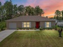 Built in 2023 and thoughtfully upgraded with luxury vinyl plank for sale in Ocala Florida Marion County County on GolfHomes.com
