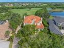 Welcome to this exquisite former model home custom built by for sale in Pinellas Park Florida Pinellas County County on GolfHomes.com