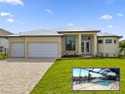 This is the LOWEST PRICED new construction Gulf access home in for sale in Cape Coral Florida Charlotte County County on GolfHomes.com