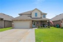Welcome to this beautifully designed 5-bedroom, 2.5-bathroom for sale in Westlake Louisiana Calcasieu Parish County on GolfHomes.com
