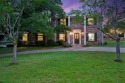 Charming brick-front, colonial-style home nestled among a for sale in Austin Texas Travis County County on GolfHomes.com