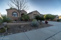 This home on the 9th hole offers mountain, water, and golf for sale in Green Valley Arizona Pima County County on GolfHomes.com