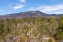 How does a mountain home with river frontage in the popular for sale in Sapphire North Carolina Transylvania County County on GolfHomes.com