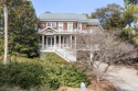 Sweeping marsh vistas on a quaint street situated just a minute for sale in Kiawah Island South Carolina Charleston County County on GolfHomes.com