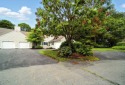 Updated kitchen, baths and flooring make this Vineyard style for sale in Mashpee Massachusetts Barnstable County County on GolfHomes.com
