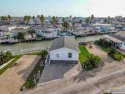 Make your waterfront life a reality! This beautiful 2-bedroom 2 for sale in Port Isabel Texas Cameron County County on GolfHomes.com