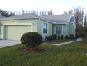 Welcome Home to the Groves, an ACTIVE 55+ Gated community!  This for sale in Land O Lakes Florida Pasco County County on GolfHomes.com
