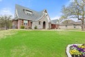This exquisite 3-bedroom, 3.5 bath, 2594 sq ft English Tudor for sale in Hideaway Texas Smith County County on GolfHomes.com
