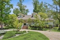 Lovely raised Acadian cottage on an oversized lot fronting the for sale in Covington Louisiana St. Tammany Parish County on GolfHomes.com