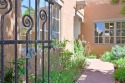 Quail Run's perfect condo - a classic Pinon C floorplan with two for sale in Santa Fe New Mexico Santa Fe County County on GolfHomes.com