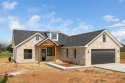 Discover luxury living at 7702 Feather Bay Dr, where new for sale in Brownwood Texas Brown County County on GolfHomes.com