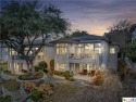 Take in the panoramic views of Lake Travis from your peninsula for sale in Spicewood Texas Travis County County on GolfHomes.com