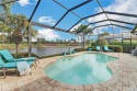 Enjoy stunning sunrise lake views through your lanai picture for sale in Bonita Springs Florida Lee County County on GolfHomes.com