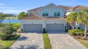 This exquisite FIRST FLOOR COACH home is just steps from one of for sale in Punta Gorda Florida Charlotte County County on GolfHomes.com