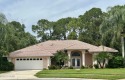 Welcome to your dream home in the highly sought-after golf for sale in Port Orange Florida Volusia County County on GolfHomes.com