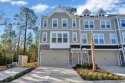 This beautifully furnished townhome shows like a model, offering for sale in North Myrtle Beach South Carolina Horry County County on GolfHomes.com