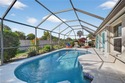 Welcome home to this beautiful Florida retreat with breezy Key for sale in Estero Florida Lee County County on GolfHomes.com