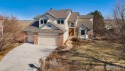 Witness the iconic beauty of the Flatirons in this two-story for sale in Longmont Colorado Boulder County County on GolfHomes.com