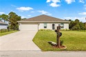 EXPERTLY DESIGNED, this LIKE NEW single-family home built in for sale in Lehigh Acres Florida Lee County County on GolfHomes.com