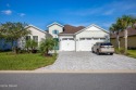 Waterfront Aruba Island Collection Home in sought after Latitude for sale in Daytona Beach Florida Volusia County County on GolfHomes.com