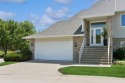 FRESH AND SLEEK CONDOMINIUM combining clean lines with practical for sale in Iowacity Iowa Johnson County County on GolfHomes.com