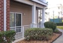 Welcome home to this stylish and modern first-floor end unit for sale in Virginia Beach Virginia Virginia Beach County County on GolfHomes.com