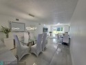 STUNNINGLY REMODELED 2BR/2BA CONDO, REIMAGINED WITH NO EXPENSE for sale in Coconut Creek Florida Broward County County on GolfHomes.com