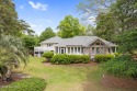 This unique, custom-built home rests on nearly  3/4  of an acre for sale in Supply North Carolina Brunswick County County on GolfHomes.com