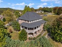 Elegant custom home offers unparalleled craftsmanship. The Oaks for sale in London Kentucky Laurel County County on GolfHomes.com