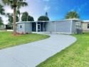 Remodeled Double-Wide manufactured home located in one of the for sale in Barefoot Bay Florida Brevard County County on GolfHomes.com