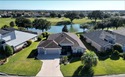 Beautifully maintained Expanded Gardenia designer offering for sale in The Villages Florida Marion County County on GolfHomes.com