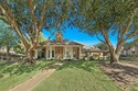 Tucked beneath mature trees in one of Rockwall's most for sale in Rockwall Texas Rockwall County County on GolfHomes.com