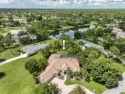 With more than 5,300 square feet under air, this Ecclestone for sale in West Palm Beach Florida Palm Beach County County on GolfHomes.com