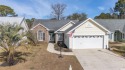 This beautifully renovated, single-story home is a must see! for sale in Murrells Inlet South Carolina Horry County County on GolfHomes.com