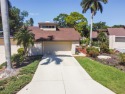 The IMG golf course is just steps away from this large 3-bedroom for sale in Bradenton Florida Manatee County County on GolfHomes.com