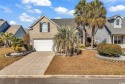 A charming three-bedroom, two-bathroom ranch-style home with a for sale in Myrtle Beach South Carolina Horry County County on GolfHomes.com