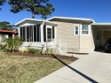 This 2017 Skyline home has a 2/2 layout with beautiful flooring for sale in Orlando Florida Orange County County on GolfHomes.com