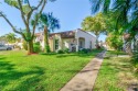 Welcome to this one-story corner villa with a gorgeous lake view for sale in Miami Lakes Florida Miami-Dade County County on GolfHomes.com